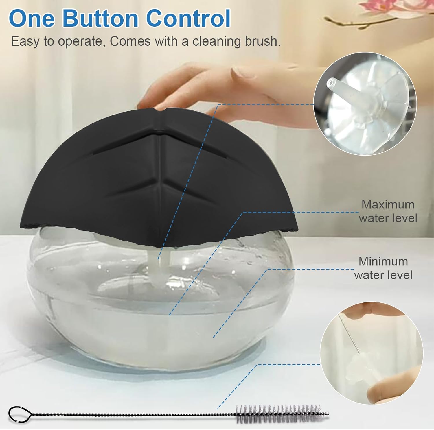 Black air humidifier emitting mist on desk setup