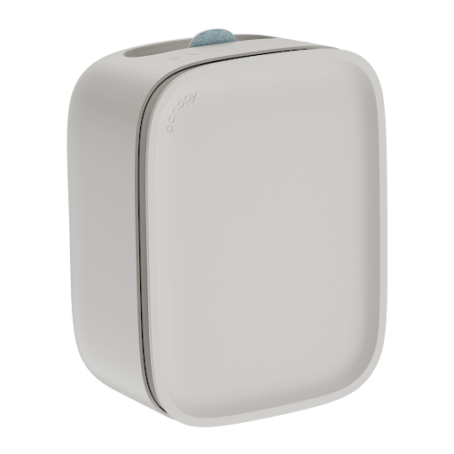 Humidifier in cream color on clean background showing side profile